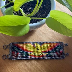 Incredible handmade beaded bird cuff bracelet